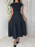 Robe longue à pois
